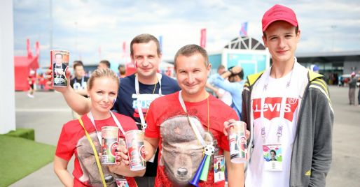 Fans with souvenir Coca-Cola cups at the 2018 FIFA World Cup